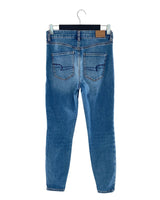 Jean skinny stretch tiro alto