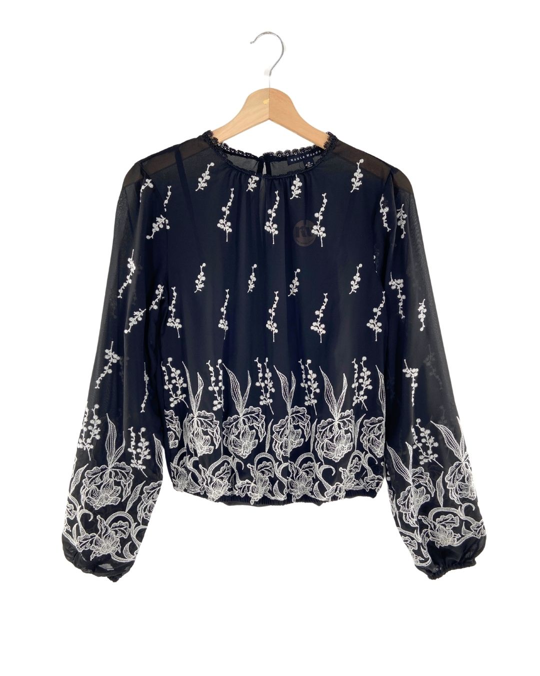 Blusa encauchada con bordados