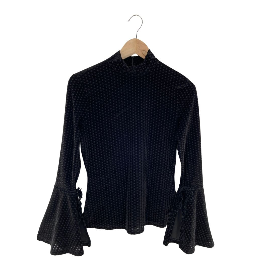 Blusa en velvet cuello alto