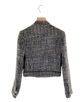 Chaqueta en tweed con cuerina