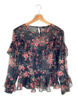 Blusa traslúcida print flores