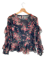 Blusa traslúcida print flores