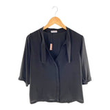 Blusa con anudado en cuello