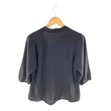 Blusa con anudado en cuello