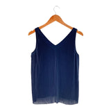 Blusa sleeveless plisada