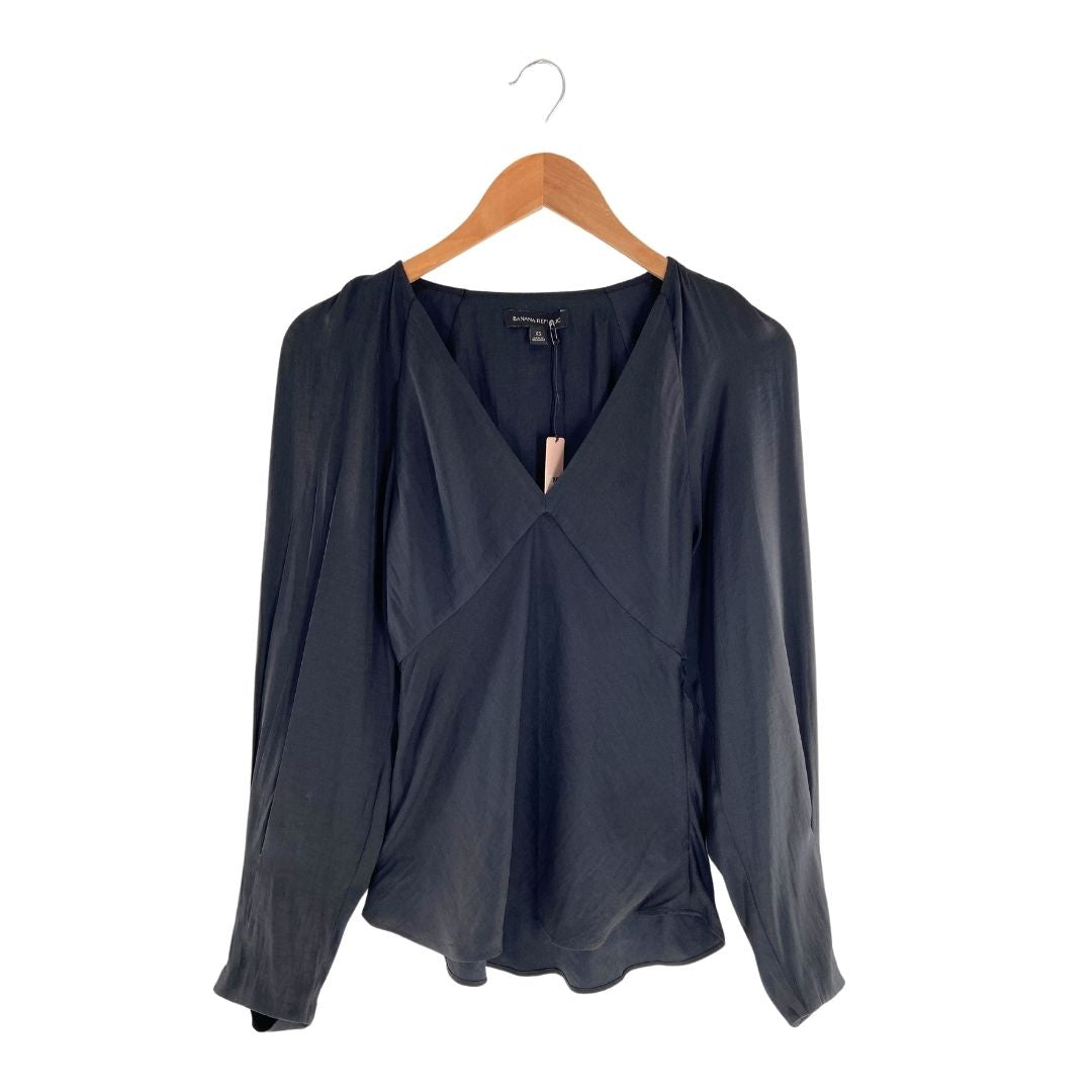 Blusa satinada cuello V